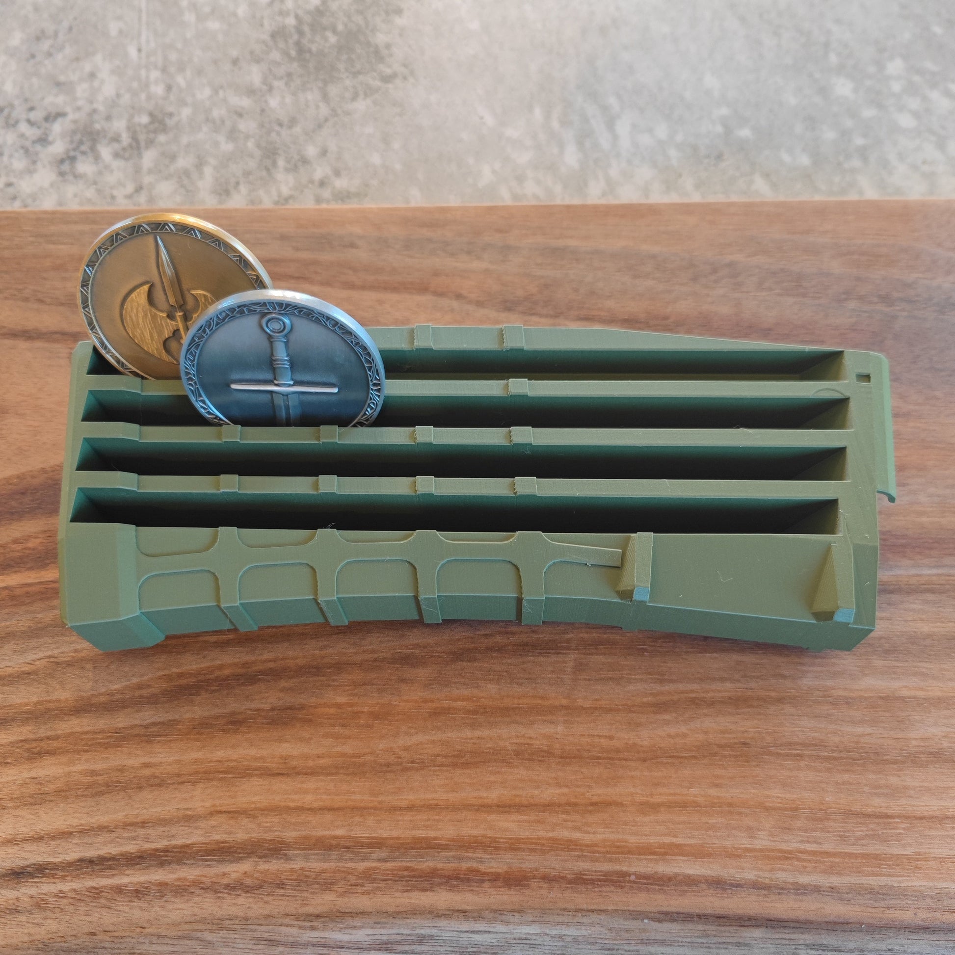 The GEN4 CoinMag - Olive by coin-mag.net is a green magazine-style display that organizes and showcases your coins with a sleek, modern design.