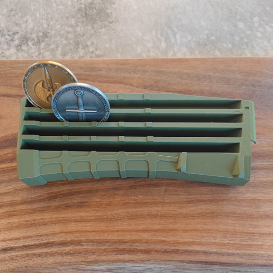 The GEN4 CoinMag - Olive by coin-mag.net is a green magazine-style display that organizes and showcases your coins with a sleek, modern design.